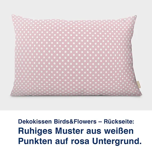 Dekokissen Birds&Flowers – Rückseite:  Ruhiges Muster aus weißen  Punkten auf rosa Untergrund. UNtergrund die Farben des Meeres.
